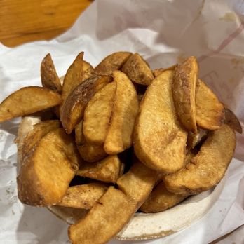 Olde Tyme Grocery - Fried potato wedges crisp and hot out of the grease. - Grocery Near Me - Lafayette, Louisiana Olde Tyme Grocery - Fried potato wedges crisp and hot out of the grease. - Grocery Near Me - Lafayette, Louisiana