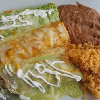 Sabor Cocinabar - Chicken enchiladas one with poblano sauce, one with chipotle and one with cilantro. - Mexican Near Me - San Antonio, Texas Sabor Cocinabar - Chicken enchiladas one with poblano sauce, one with chipotle and one with cilantro. - Mexican Near Me - San Antonio, Texas