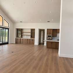 Rays Carpet One Floor & Home - Opulux laminate in Aurora, great room into the kitchen, new build in Escalon.