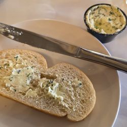 Shelridge Country Club Maintenance - Bread slice with a herbed-compound butter