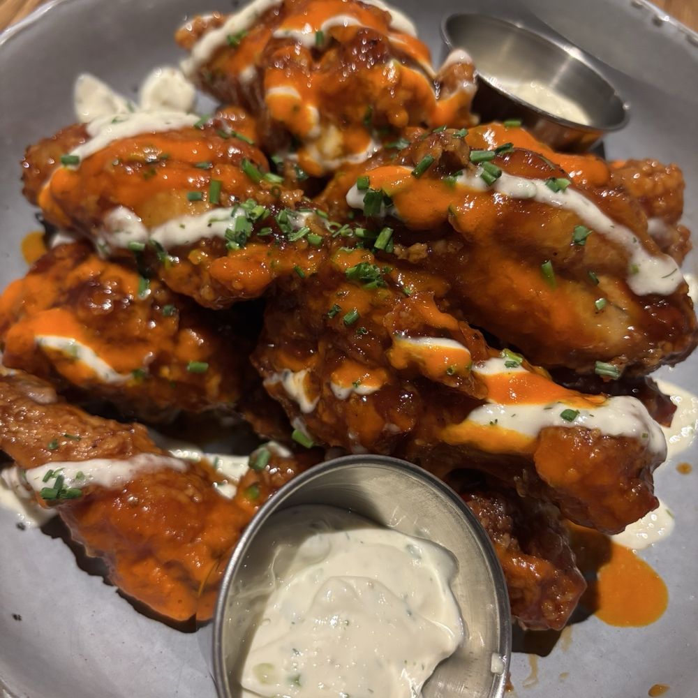 Marcus Live! Bar & Grille - wings w 1/2 everything sauce 1/2 buffalo - American Near Me - East Rutherford, New Jersey Marcus Live! Bar & Grille - wings w 1/2 everything sauce 1/2 buffalo - American Near Me - East Rutherford, New Jersey