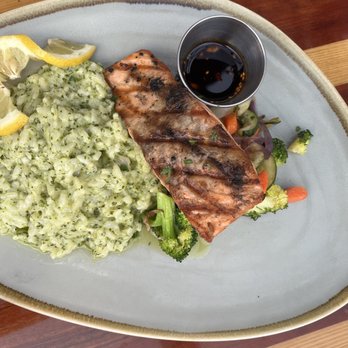 Tauro Cocina - Cilantro risotto and salmon - Italian Near Me - Milwaukee, Wisconsin Tauro Cocina - Cilantro risotto and salmon - Italian Near Me - Milwaukee, Wisconsin