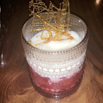 CW's Gin Joint - Raspberry purée dessert with caramelized sugar decoration on top - Cocktail Bars Near Me - Tampa, Florida CW's Gin Joint - Raspberry purée dessert with caramelized sugar decoration on top - Cocktail Bars Near Me - Tampa, Florida