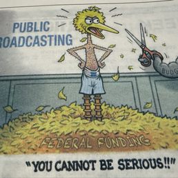 Back table, local paper cartoon. Back table, local paper cartoon.