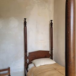 Gallier House - The bedroom of an enslaved worker. This house held four people in slavery, the sister property held 8.