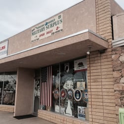 Doc's Genuine World Military - Storefront park right in front