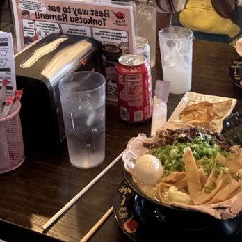 Hakata Ikkousha Ramen - Cluttered table. Limited space - Ramen Near Me - Costa Mesa, California