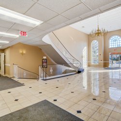 Rockin Massage - Inside lobby of 1010 jorie, go downstairs to lower level suites