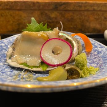 Takao - a plate of food and a glass of beer - Sushi Bars Near Me - Los Angeles, California Takao - a plate of food and a glass of beer - Sushi Bars Near Me - Los Angeles, California