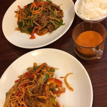 Golden Triangle - Crispy Basil Beef (top) and Sambal Sauce Chicken (bottom) with hot Burmese Tea - Thai Near Me - Philadelphia, Pennsylvania