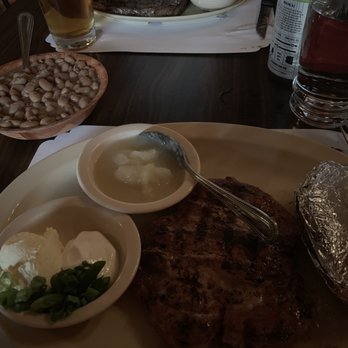Daisy Mae's Steakhouse - Pork chop with applesauce, baked potato and beans - Steakhouses Near Me - Tucson, Arizona Daisy Mae's Steakhouse - Pork chop with applesauce, baked potato and beans - Steakhouses Near Me - Tucson, Arizona