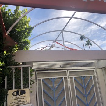 Palm Springs Rendezvous - Can you see the awning barely hanging on? - Hotels Near Me - Palm Springs, California Palm Springs Rendezvous - Can you see the awning barely hanging on? - Hotels Near Me - Palm Springs, California