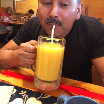 Islands Restaurant - Bottoms up! Delicious orange juice. No refills on orange juice, but that's not a problem with the amount they serve you! - Burgers Near Me - Orange, California