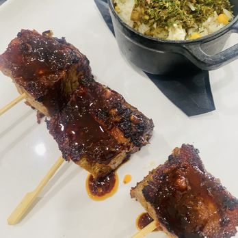 Black Pork - Pork belly skewers and side of rice - don't be deceived because the pork are so big in portions compared to the pictures - American Near Me - Long Beach , California Black Pork - Pork belly skewers and side of rice - don't be deceived because the pork are so big in portions compared to the pictures - American Near Me - Long Beach , California