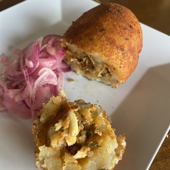 Casera Latin Kitchen and Bakery - Papa rellena with pickled onions - Peruvian Near Me - Oceanside, California