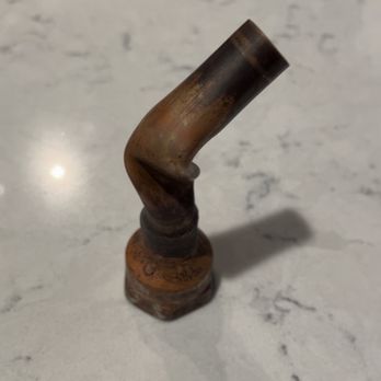 TPM Services - The twisted pipe after replacement. This copper pipe should be straight. - Plumbing Near Me - Las vegas, Nevada TPM Services - The twisted pipe after replacement. This copper pipe should be straight. - Plumbing Near Me - Las vegas, Nevada