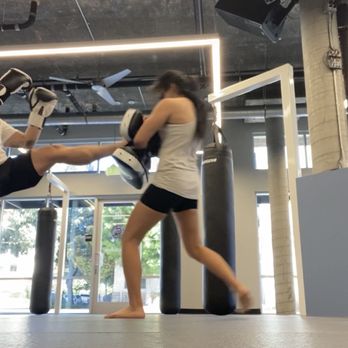 Krav Maga Unleashed - Practicing striking combinations using Thai pads. - Martial Arts Near Me - Pasadena, California Krav Maga Unleashed - Practicing striking combinations using Thai pads. - Martial Arts Near Me - Pasadena, California