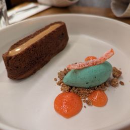 Daily/weekly dessert special, spiced cake, ice cream, candied bitter citrus peel Daily/weekly dessert special, spiced cake, ice cream, candied bitter citrus peel