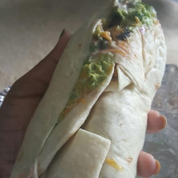 Buena Mexican Grill - a hand holding a burrito - Mexican Near Me - Baltimore, Maryland