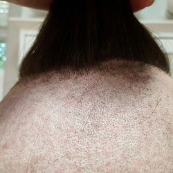 The Barber Center - To the right you can see the chunk taken out of his hard part (which is quite uneven)