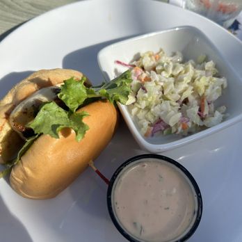 Dry Dock Waterfront Grill - 1/2 of a blacked red snapper sandwich, with a side of Cole slaw - Seafood Near Me - Longboat Key, Florida Dry Dock Waterfront Grill - 1/2 of a blacked red snapper sandwich, with a side of Cole slaw - Seafood Near Me - Longboat Key, Florida
