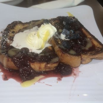 Brunch Room Bistro - French toast (not stuffed) with berry coulis and lemon curd - Breakfast & Brunch Near Me - Forney, Texas Brunch Room Bistro - French toast (not stuffed) with berry coulis and lemon curd - Breakfast & Brunch Near Me - Forney, Texas