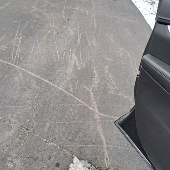 OZ Property Maintenance - This driveway is only two years old and was sealcoated last September...right before this winter season (2024-2025). - Lawn Services Near Me OZ Property Maintenance - This driveway is only two years old and was sealcoated last September...right before this winter season (2024-2025). - Lawn Services Near Me