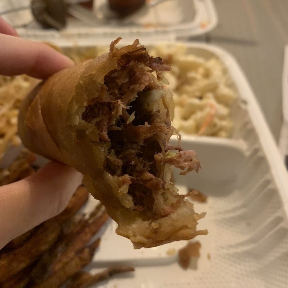 Hunny Beez - a hand holding a half eaten sandwich - Filipino Near Me - Hillsboro, Oregon Hunny Beez - a hand holding a half eaten sandwich - Filipino Near Me - Hillsboro, Oregon