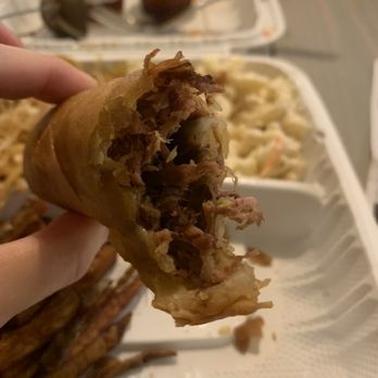 Hunny Beez - a hand holding a half eaten sandwich - Filipino Near Me - Hillsboro, Oregon Hunny Beez - a hand holding a half eaten sandwich - Filipino Near Me - Hillsboro, Oregon