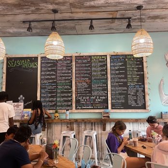 Playa Bowls - people sitting at tables in a restaurant - Acai Bowls Near Me - West Chester, Pennsylvania Playa Bowls - people sitting at tables in a restaurant - Acai Bowls Near Me - West Chester, Pennsylvania