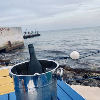 Seaside Cafe - Bottle of Kim Crawford Sauvignon Blanc with a view! - Pizza Near Me - Key West, Florida Seaside Cafe - Bottle of Kim Crawford Sauvignon Blanc with a view! - Pizza Near Me - Key West, Florida