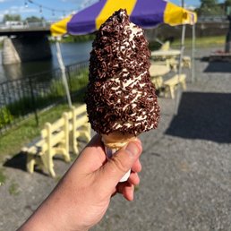 Medium vanilla soft serve with chocolate sprinkles.