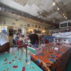 Interior of restaurant. Note: ceiling falling apart.