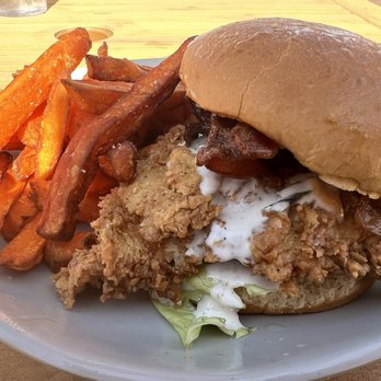Chicken N Pickle - Fried pimento cheese chicken with sweet potato fries - American Near Me - Oklahoma City, Oklahoma Chicken N Pickle - Fried pimento cheese chicken with sweet potato fries - American Near Me - Oklahoma City, Oklahoma