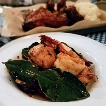 Hat Yai - Prawns and scallops sauteed with wild ginger, kaffir lime leaf, figs, padron peppers, and Mekhong rum at Hat Yai - Thai Near Me - Portland, Oregon