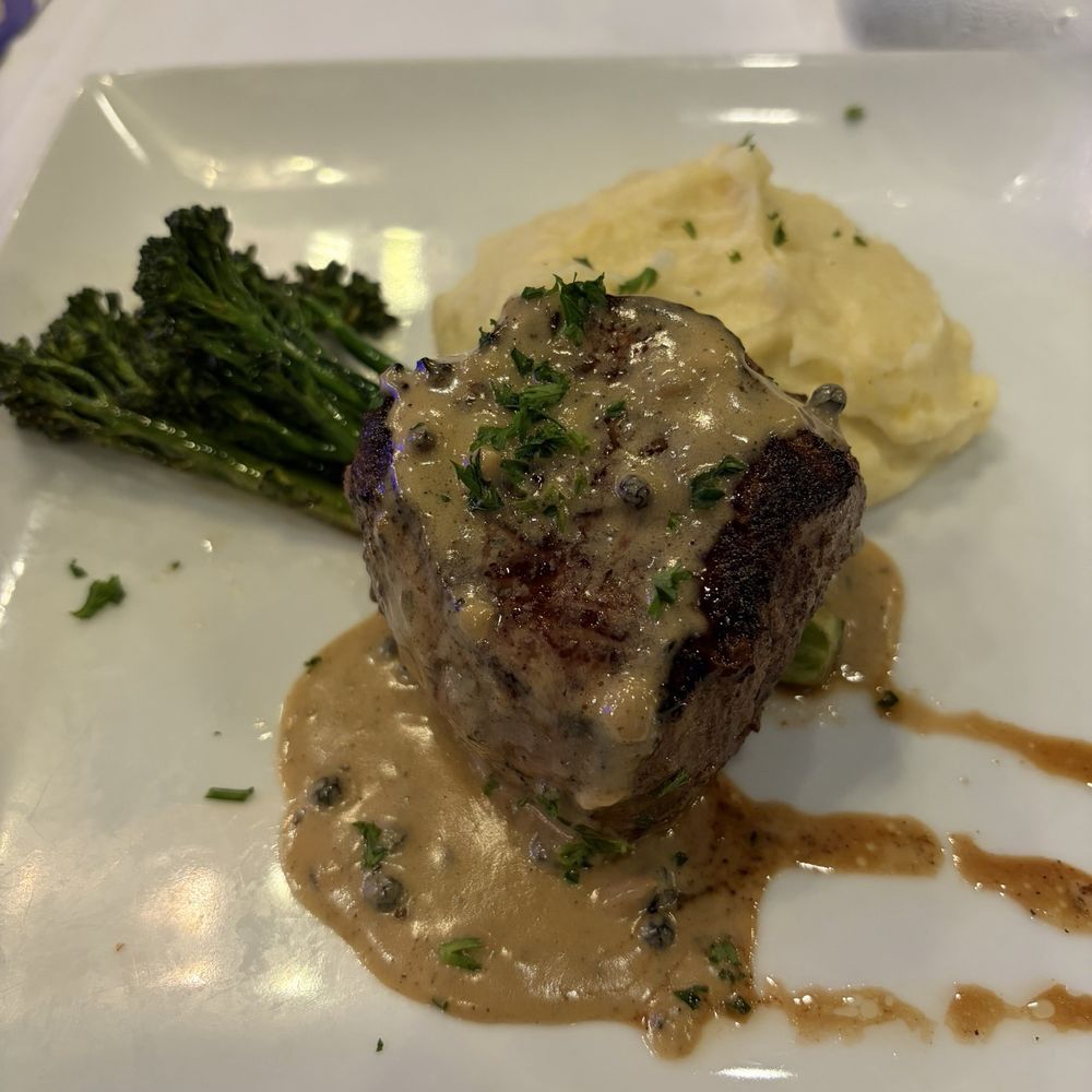 Oakhill Wine + Bistro - Very small portion of filet mignon, creamy mashed potatoes, and broccolini - Wine Bars Near Me - Fresno, California Oakhill Wine + Bistro - Very small portion of filet mignon, creamy mashed potatoes, and broccolini - Wine Bars Near Me - Fresno, California