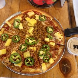 Build Your Own w/ vegan mozzarella, vegan sausage, jalapeño, and pineapple. Build Your Own w/ vegan mozzarella, vegan sausage, jalapeño, and pineapple.