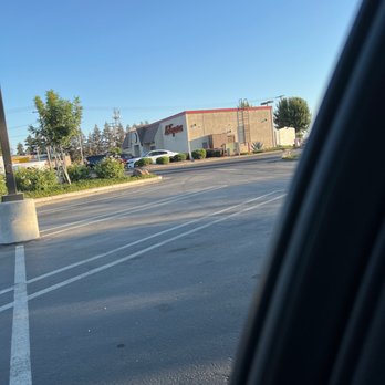 La Taqueria - a view of a parking lot from a car window - Mexican Near Me - Turlock, California