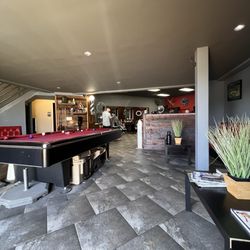 Sharky's Barbershop - Pool table in waiting area