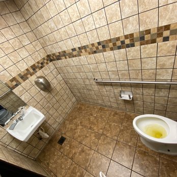 Waffle House - a toilet and sink in a public restroom - Diners Near Me - New Orleans, Louisiana Waffle House - a toilet and sink in a public restroom - Diners Near Me - New Orleans, Louisiana