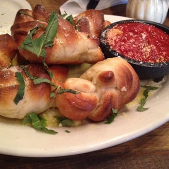 Five Points Pizza - Our full order of knots with a couple missing. Fresh basil. Yummy sauce. - Italian Near Me - Nashville, Tennessee Five Points Pizza - Our full order of knots with a couple missing. Fresh basil. Yummy sauce. - Italian Near Me - Nashville, Tennessee