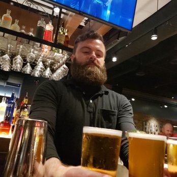 Bar Louie - Katy - Lee serving his guests with great pleasure! - Bars Near Me - Katy, Texas Bar Louie - Katy - Lee serving his guests with great pleasure! - Bars Near Me - Katy, Texas