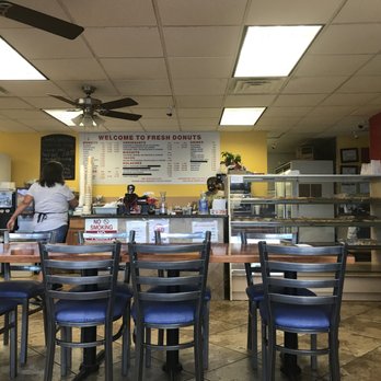 Donuts And Breakfast - a man sitting at a table - Breakfast & Brunch Near Me - Giddings, Texas