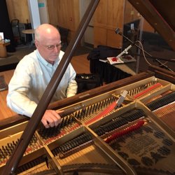 Jeffrey Schuman - Jeff tuning a Steinway grand piano.