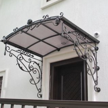 Custom designed Doors, Gates, Fences & Awnings - Igor Security Gates & Doors combine security with architectural mastery to create safe, secure gates, doors, fencing, and more for homes, businesses, parks and museums. These hand-forged iron sculptural elements are centerpieces of design as well as safeguards to entrances, balconies, staircases and more.

Craftsman Igor Ostrovsky uses his expertise as an art school graduate and four years of training under Old-World European blacksmiths to bring Brooklyn, New York custom security gates and doors that are also beautiful, guarded artisan relics. Glass, wood and stone placed artfully between twisting, hand-forged iron patterns and sealed with faux finishes, choice colors and powder coated finishes makes each piece your own architectural masterpieces.

Igor Ostrovsky works personally with each client to construct the metalwork sculptural icon you envision to welcome your guests, guide them up your stairs and guard your fireplace, balcony and yard. For an impressive, artistic piece protecting your home or business, contact master craftsman Igor Ostrovsky via phone or email.