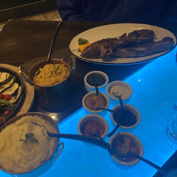 Libertango Steakhouse - Short. Ribs Assortment of specialty sauces - Steakhouses Near Me - Sandy, Utah Libertango Steakhouse - Short. Ribs Assortment of specialty sauces - Steakhouses Near Me - Sandy, Utah