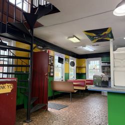 Caribbean Delight - This is the dining area. Very clean and love the Jamaican atmosphere.
