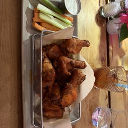 Spice Brined Chicken Wings tossed in Buffalo Sauce and served with Celery, Carrots and Ranch Dressing Spice Brined Chicken Wings tossed in Buffalo Sauce and served with Celery, Carrots and Ranch Dressing