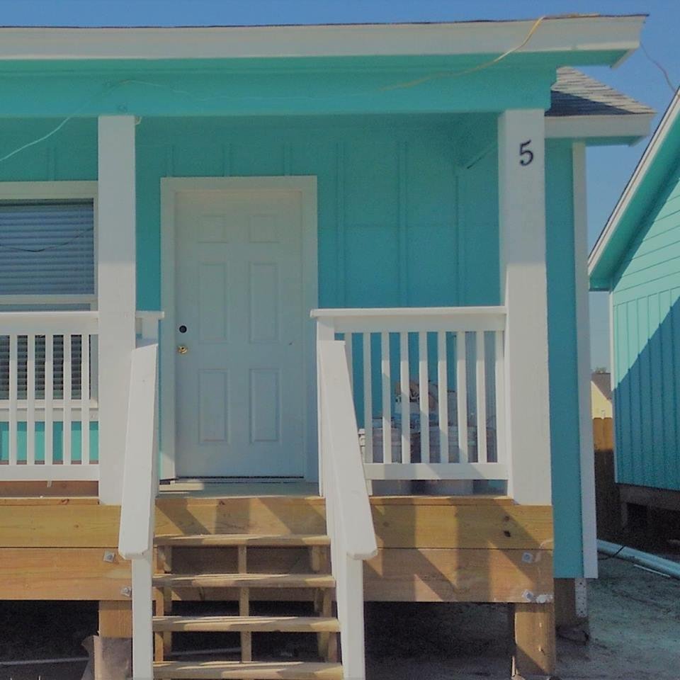 Slide of Coastal Cabin & Windstorm Construction