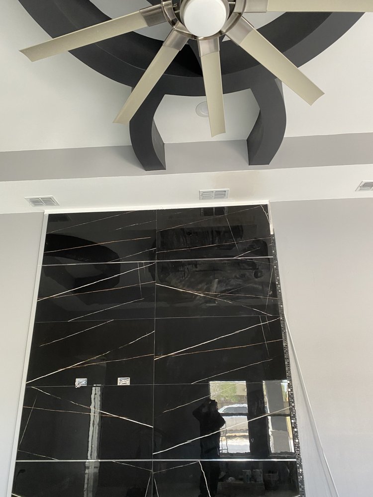 Slide of Adrian’s Complete Remodeling & Roofing